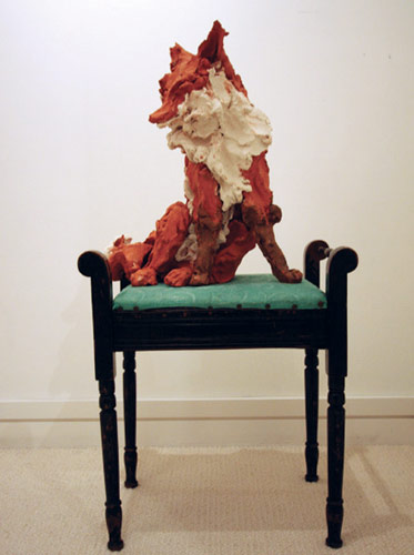 Little red fox on piano